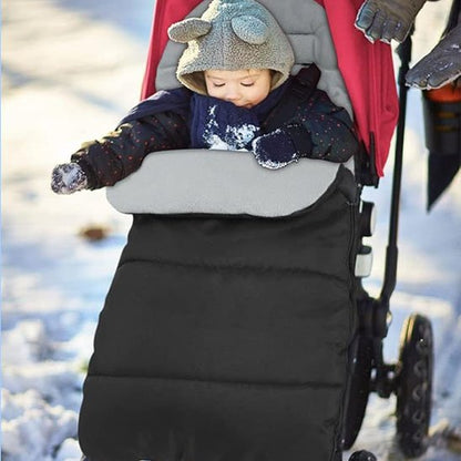 Chanceliere poussette noir et gris en neige