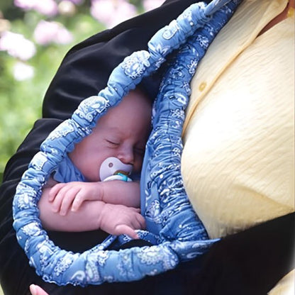 Echarpe de portage bébé dedant dort sur sa maman