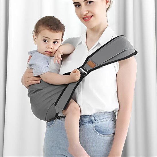 Porte bebe hanche gris enfant sur la hanche