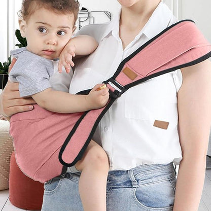 Porte bebe hanche rose enfant sur la hanche