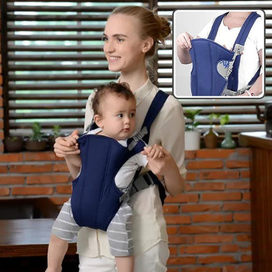Porte bebe sur maman portant bebe face 