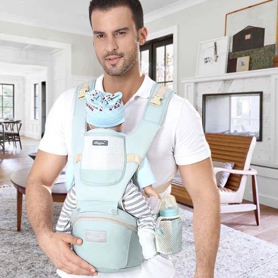 Porte bebe vert bébé face son père