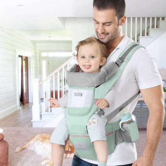 Porte bebe vert sur papa main libre 