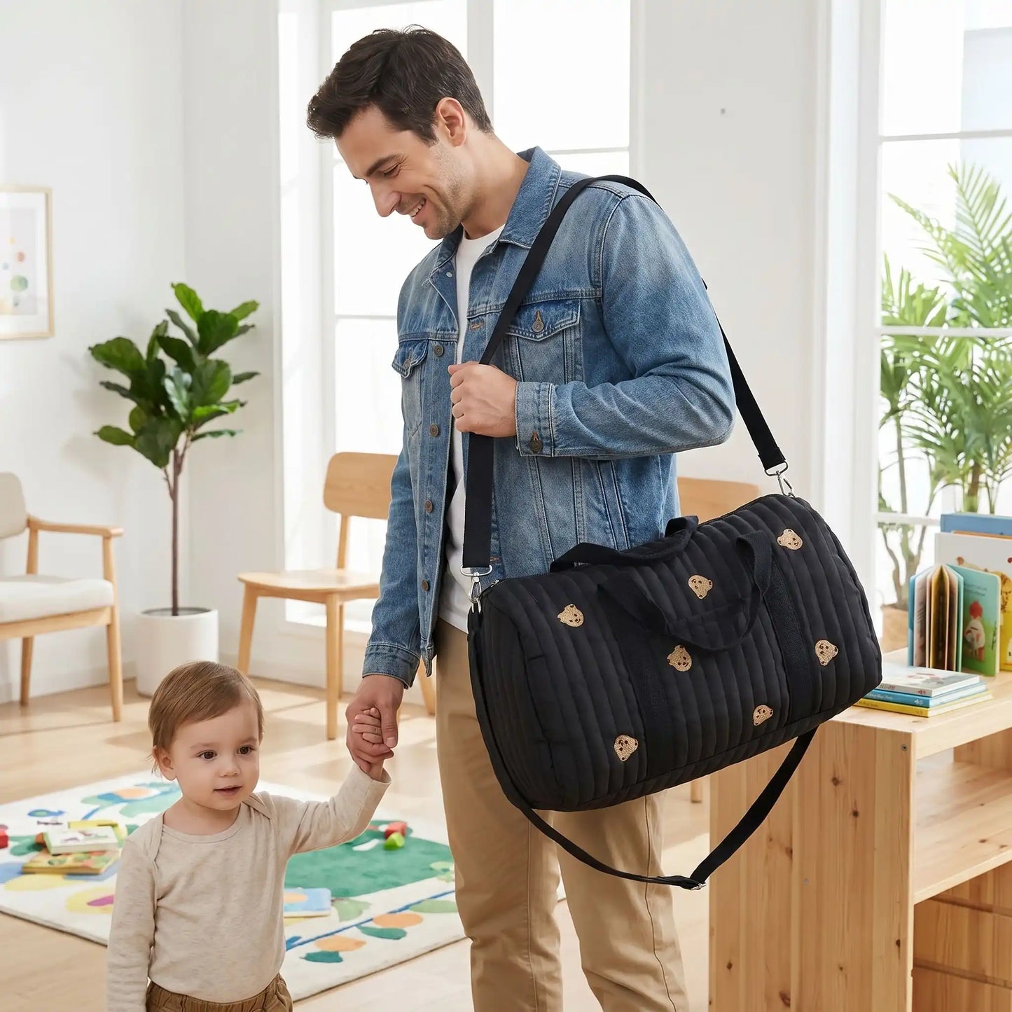 sac a langer noir papa avec son enfant au rendez-vous medical