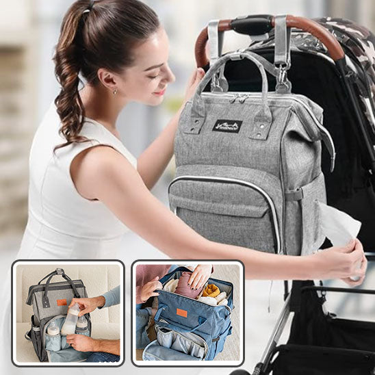 sac à dos à langer accroché sur poussette maman sort lingette